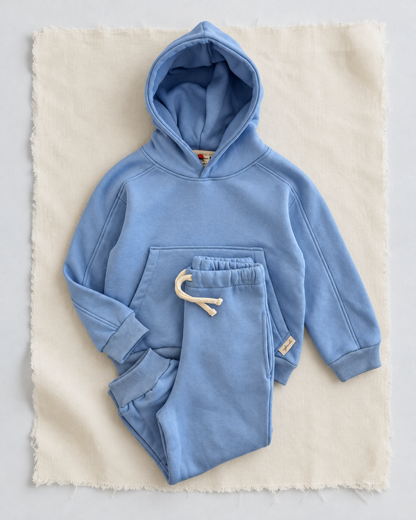 RG Brand RG1786 mavi çocuk kapüşonlu eşofman takımı, 3–9 yaş; üst ve pantolonun birlikte görünümü.