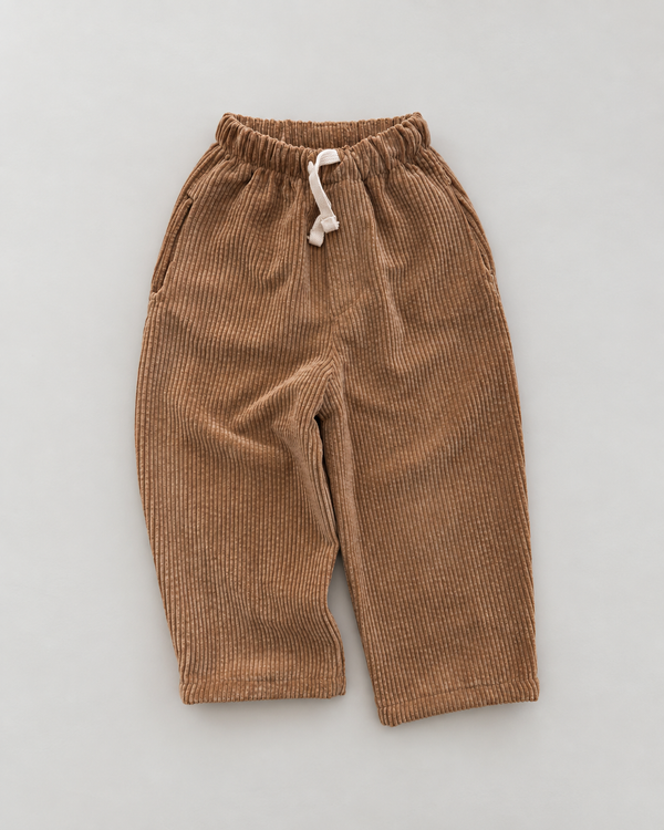 RG Brand RG1799 bej fitilli kadife çocuk pantolon; lastikli bel, ekru bağcık ve yan cepler, önden görünüm.