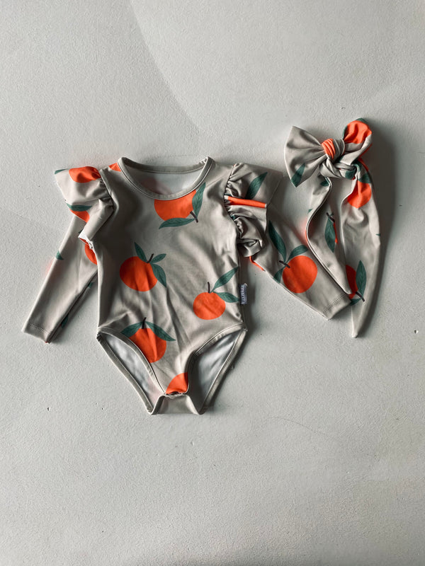 Baby-Badeanzug mit Rüschen und langen Ärmeln | RG337
