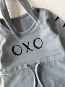 فستان أطفال منقوش بطبعات أوكسو وعصابة رأس