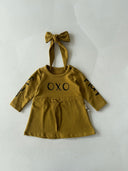 فستان أطفال منقوش بطبعات أوكسو وعصابة رأس