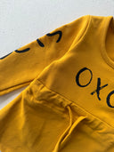 فستان أطفال منقوش بطبعات أوكسو وعصابة رأس