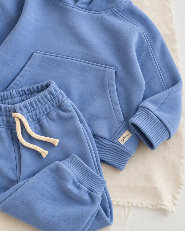 RG Brand RG1786 mavi çocuk kapüşonlu eşofman takımı, 3–9 yaş; kumaş, cep ve kordon yakın planı.