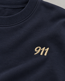 RG Brand RG3746 lacivert genç sweatshirt yakın plan; 911 nakışı ve kumaş dokusu.