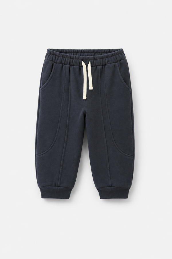 Lacivert çocuk jogger pantolon, bağcıklı bel, kavisli cepler ve panel dikişleriyle önden görünüm | RG1790