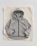Gri RG1791 kapüşonlu fermuarlı sweatshirt düz zeminde ürün görünümü