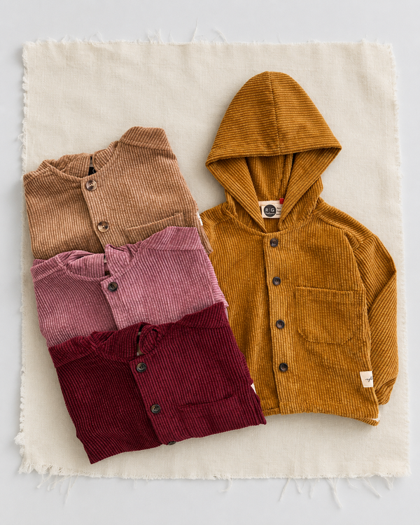 RG Brand RG1798 hooded corduroy kids' jackets in mustard, beige, pink and burgundy, flat-lay group view.